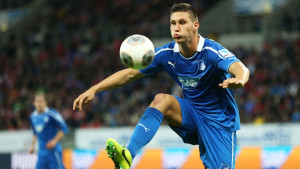 SINSHEIM, GERMANY - NOVEMBER 02: Niklas Suele of Hoffenheim controls the ball during the Bundesliga match between 1899 Hoffenheim and Bayern Muenchen at Rhein-Neckar Arena on November 2, 2013 in Sinsheim, Germany. (Photo by Simon Hofmann/Bongarts/Getty Images)